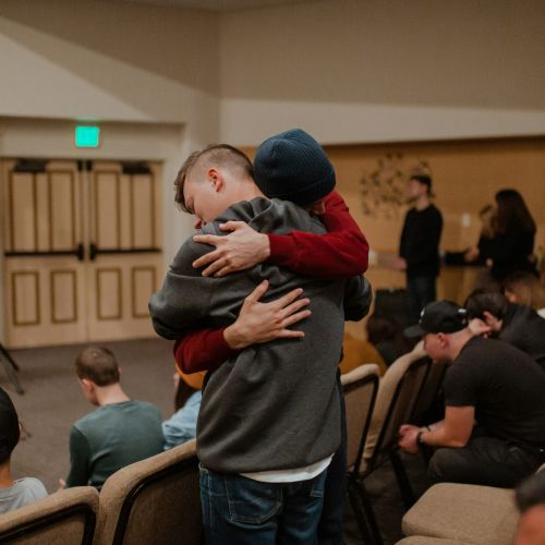 An open room with a group of individuals in a circle, attentively listening to each other at a Pikeville, Kentucky Drug and Alcohol Rehab Resources session. This setting fosters understanding and growth for participants seeking recovery.