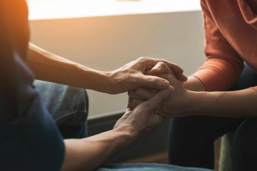 A woman understanding addiction through the process of an individualized treatment plan.